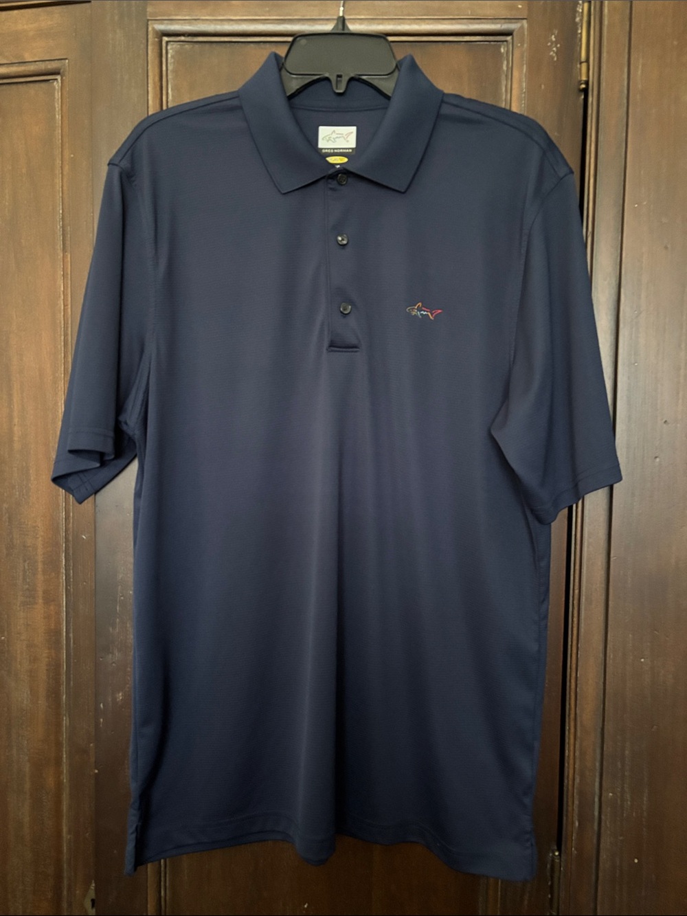 Greg Norman Collection Navy Polo with Small Embroidered Shark large